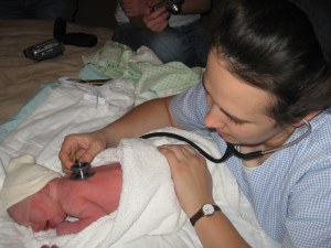 Newborn Exam Performing a newborn exam on sweet little Kalia within an hour of her birth